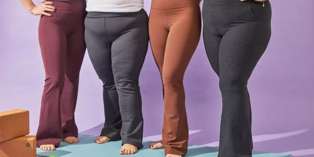 Group of women wearing flare leggings on yoga mat