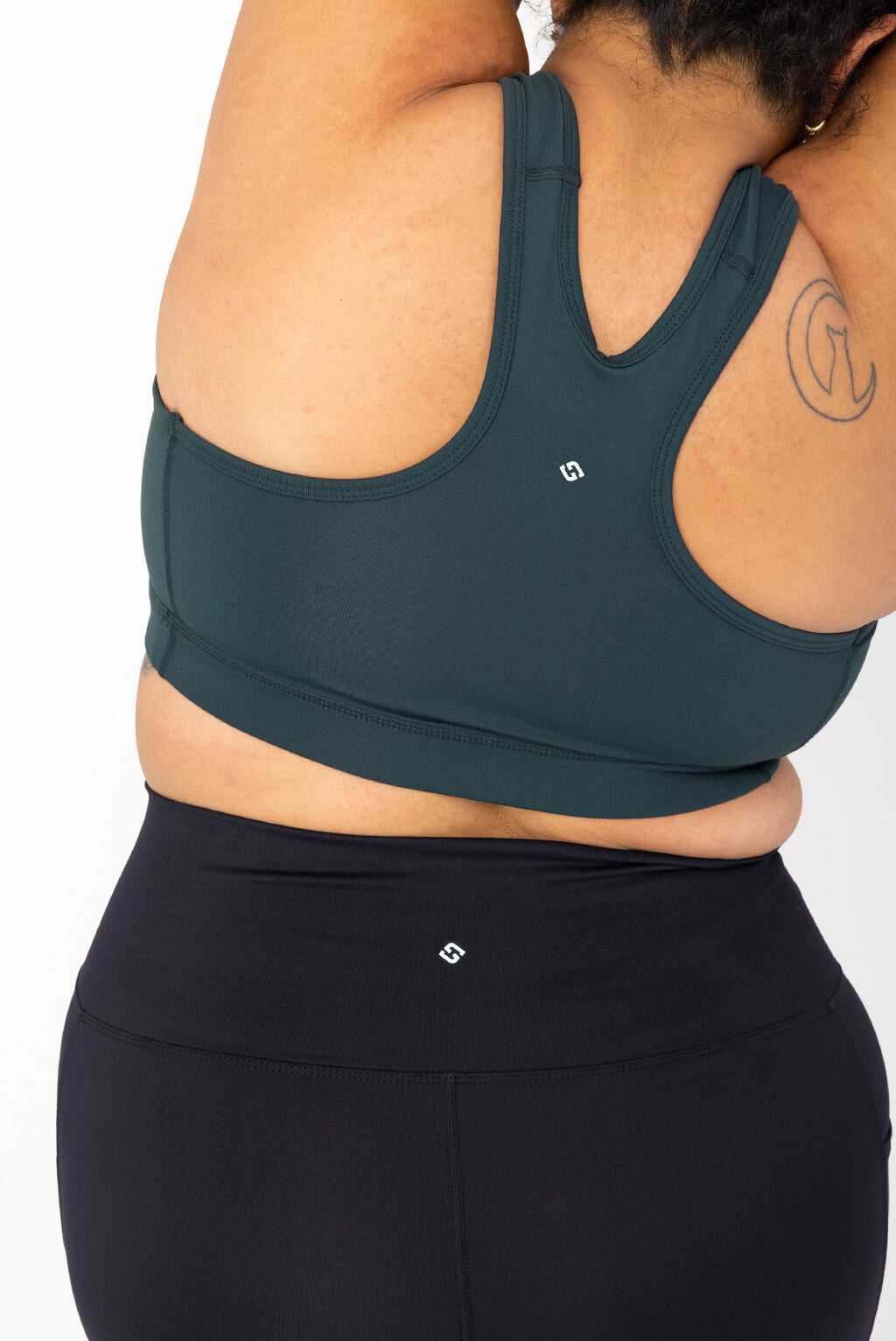 plus size compression sports bra in evergreen, back