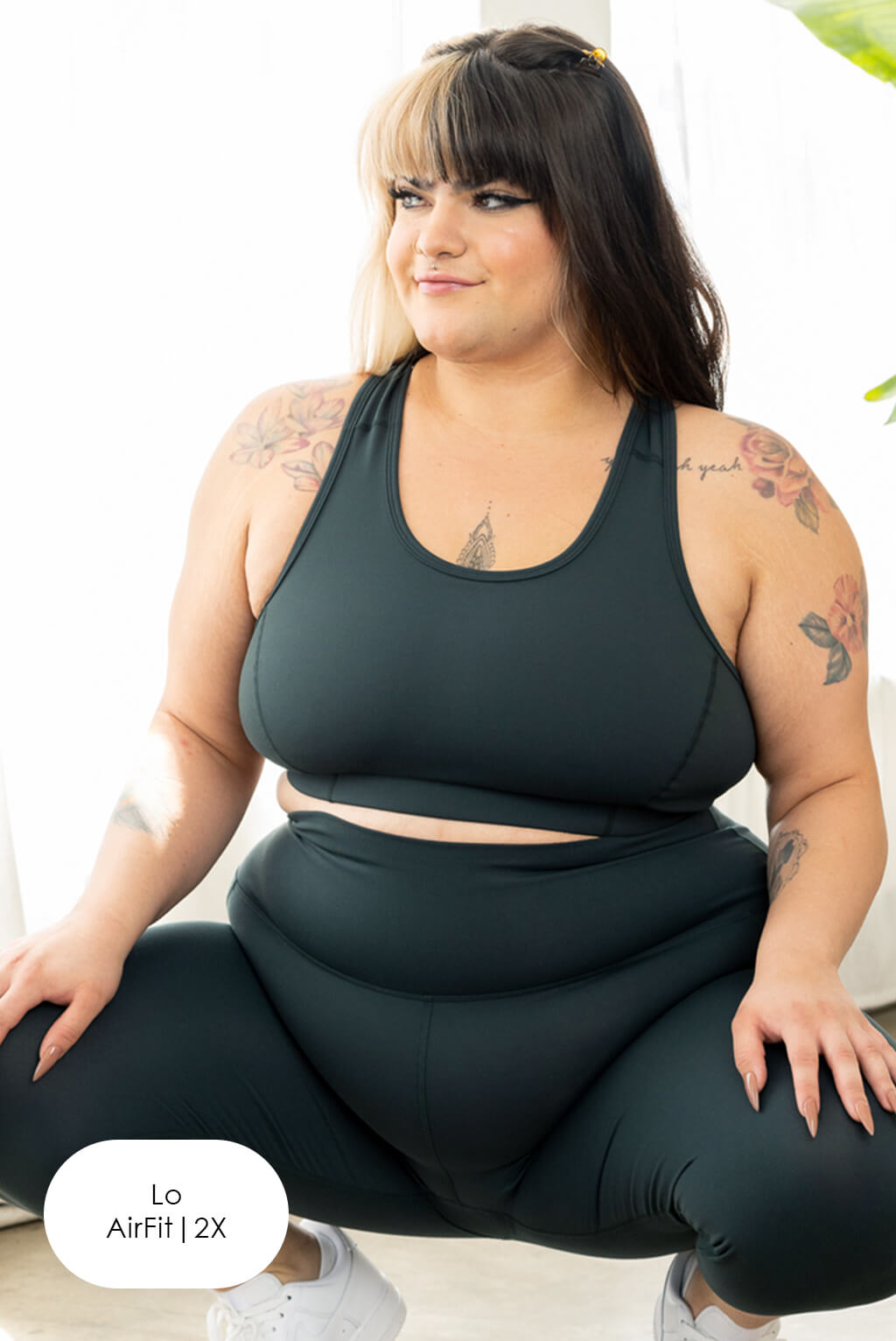 plus size compression sports bra in evergreen, opaque and squat proof